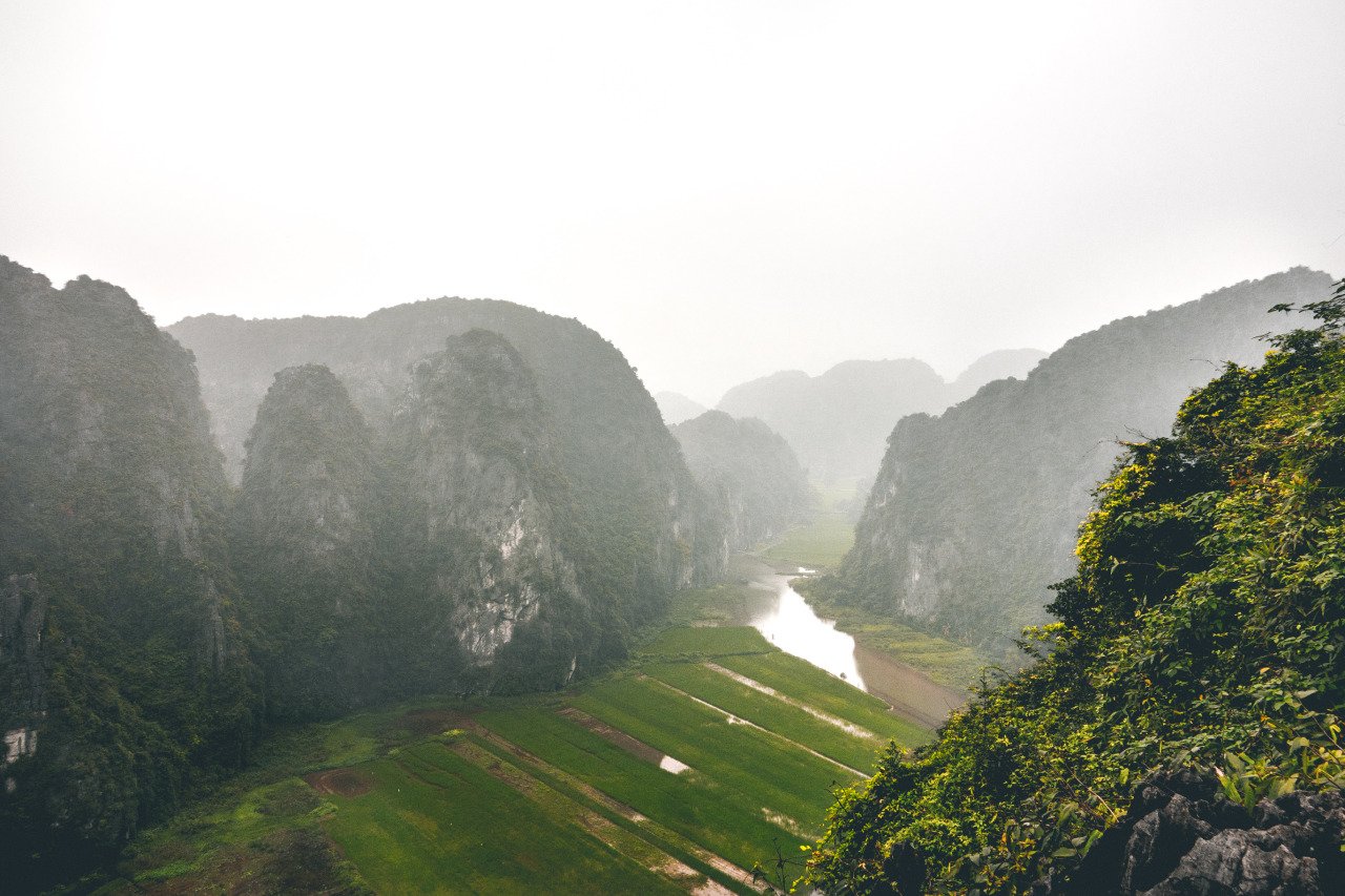 A person standing at the top of Mua Cave in Ninh Binh, Vietnam.